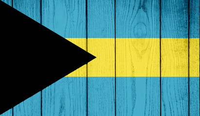 Flag of The Bahamas on wooden background