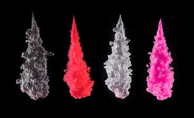 Coloured acrylic ink mixing in water on black