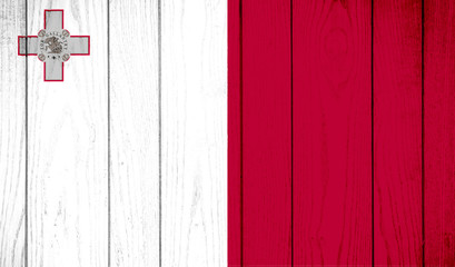 Flag of Malta on wooden background