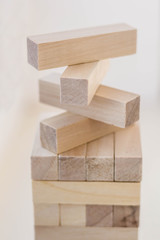 Wood block tower game on white background