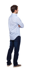 Back view of man in dark jeans. Standing young guy.