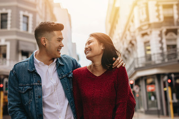 Asian couple outdoors in the city