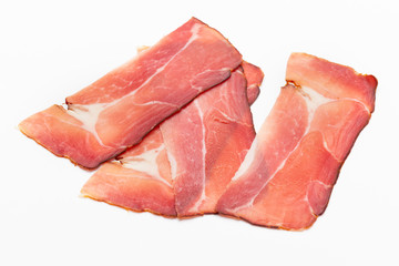 Hamon sliced on white background. Spanisch traditional meat.