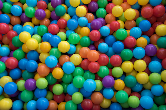 Colored balls in a play area for children image for background use with copy space