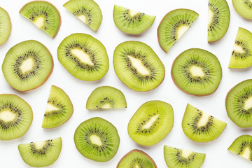 Fototapeta premium Kiwi fruit slices on white background.