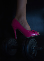 Pink high heels, shoes for women feet, fitness items, heavy dumbbell