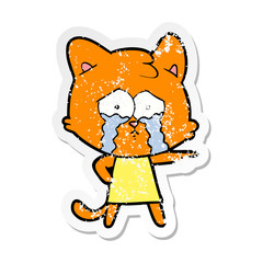 Fototapeta premium distressed sticker of a cartoon crying cat