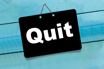 Quit on wooden background