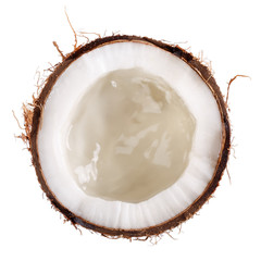 Half coconut with coconut water inside isolated on white. Top view.