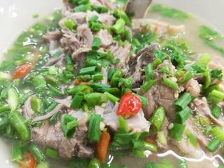 hot and spicy pork rib hot pot with tamarind and Thai herbs