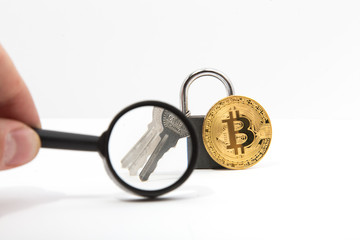Obraz na płótnie Canvas bitcoin with lock on white background