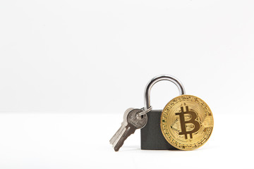bitcoin with lock on white background