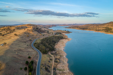 Riverina Highway and bridge across Murray River at sunset. Lake Hume Village, New South Wales, Australia