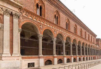 arched covered walkway at University Renaissance building  "Ca Granda", Milan, Italy