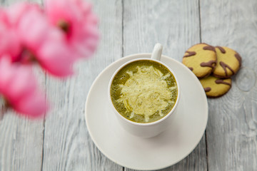 green latte and some cookies with matcha