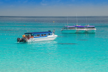 Boats for transporting tourists in the sea.Summer sea travel.Summer beach travel.