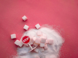 Stop sign on the sugar, warned that the sugar too much will make unhealthy nutrition, obesity,...