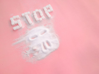 Stop sign on the sugar, warned that the sugar too much will make unhealthy nutrition, obesity,...