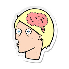 sticker of a cartoon head with brain symbol