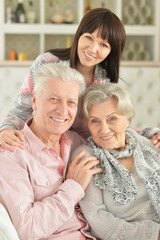 Portrait of happy family posing at home