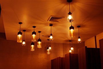 Look up at the top Antique lamps Filled or Light bulbs on the ceiling with light effects