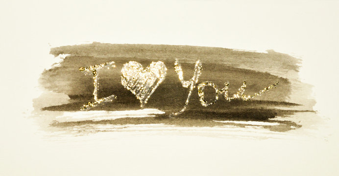 Glittering words - I Iove You - on black watercolor splash in nostalgic colors, made with golden glitter