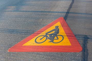 Bicycle path drawn on the asphalt road