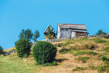 Scenic countryside landscape with traditional house in Romania