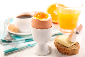 breakfast with egg, coffee and orange juice