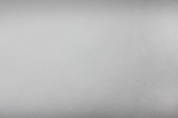 Grunge texture background of pale grey and white surface. Dirty rustic gray paper material texture, empty abstract pattern backdrop frame for copy space. Grain old seamless uneven background 