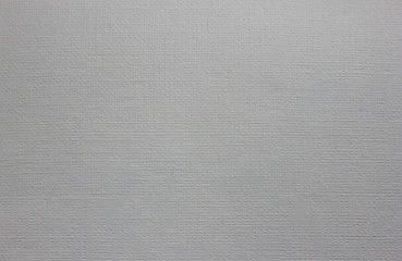 Paper texture background of light craft note page material design. Pale grey white pattern of paper or fabric canvas. Close up top view of greyish seamless surface backdrop with empty copy space