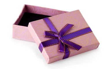 Pink and purple gift box with bow isolated on white background
