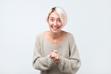 Pretty fancy trendy modern charming cute woman with dyed hairstyle can not believe her eyes.