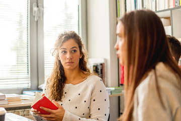 Students learning in library