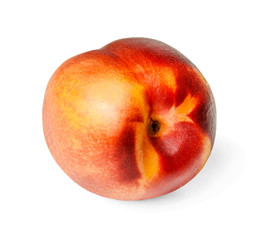 Fresh juicy nectarine on a white isolated background. Close-up. Side view.