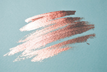 Abstract pink watercolor stain on blue background for your design