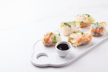 Vietnamese spring rolls with shrimps and vegetables. Copyspace