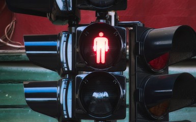 Traffic lights showing the red man for Don't Walk