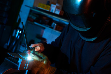 Close-up of welder at work