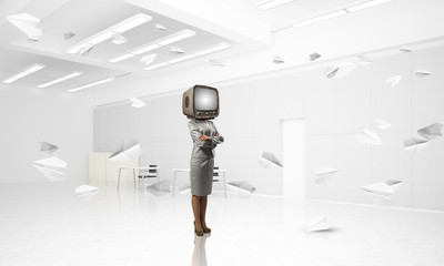 Business woman with an old TV instead of head.
