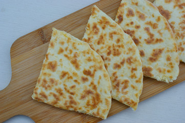 Georgian khachapuri imeruli. Georgian traditional food, hot khachapuri