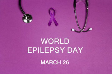 Purple epilepsy awareness ribbon with stethoscope.