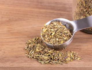 Chopped Italian Seasoning on a Wooden Table