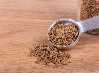 Caraway Seeds on a Wooden Table