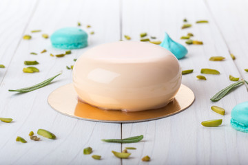 French mousse cake covered with mirror glaze