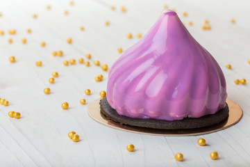 French mousse cake covered with mirror glaze