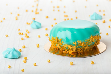 French mousse cake covered with mirror glaze