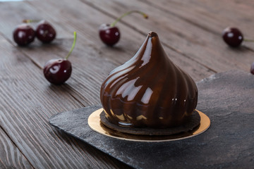 French mousse cake covered with mirror glaze
