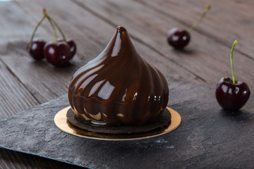 French mousse cake covered with mirror glaze