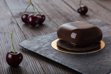 French mousse cake covered with mirror glaze